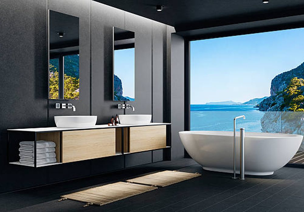 Remodeled bathroom with floating oak vanity, soaking tub and glass walk-in shower